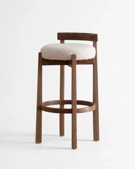 Rovex luxury bar stool front view with round cushioned seat and wooden frame with footrest ring